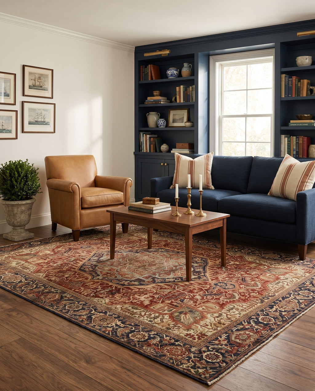 Azar Brick & Navy rug in a New England living room with navy bookshelves and a navy sofa