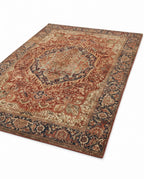 Azar Brick & Navy rug, angled view showing the full design