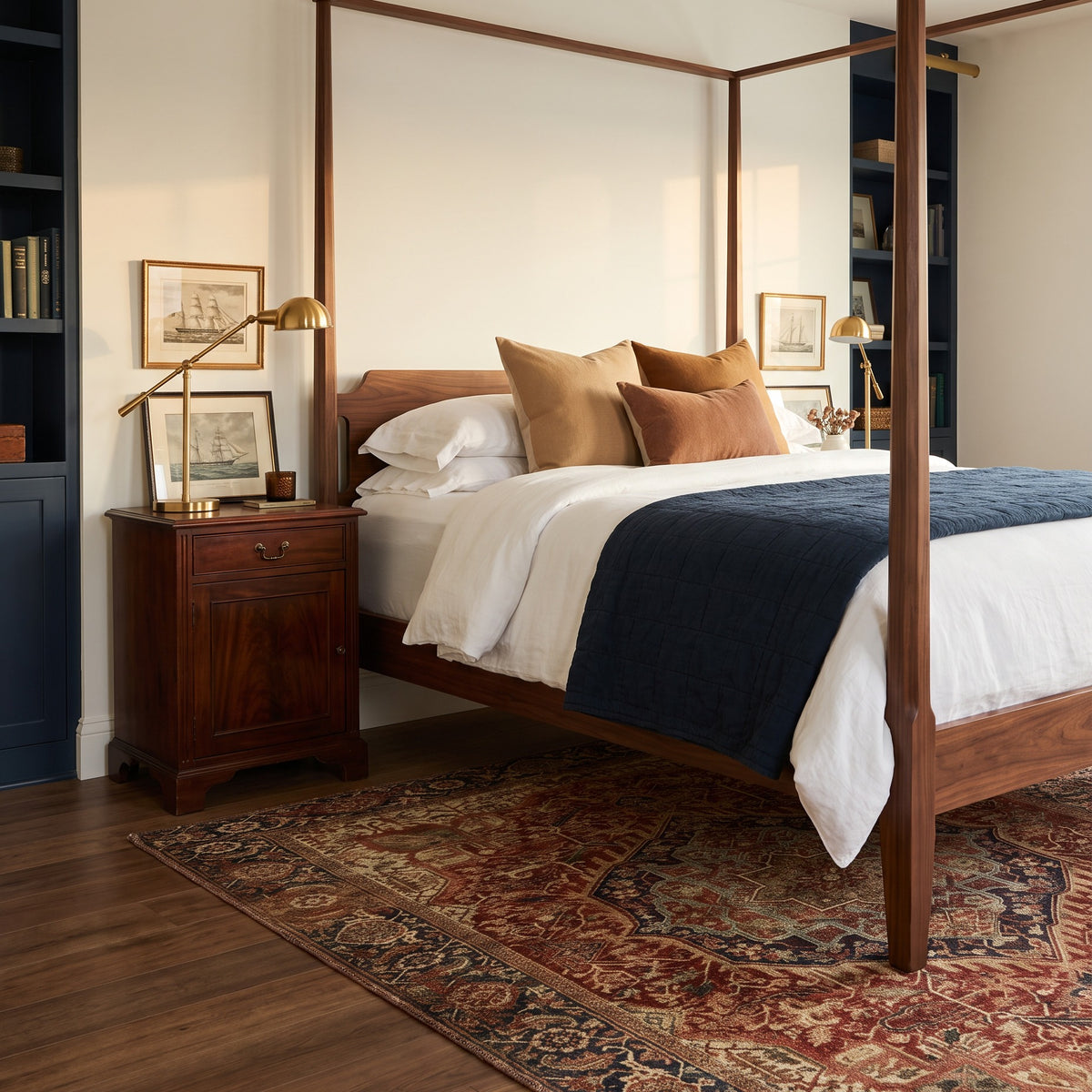 Azar Brick & Navy rug beside a four-poster bed with a navy quilt
