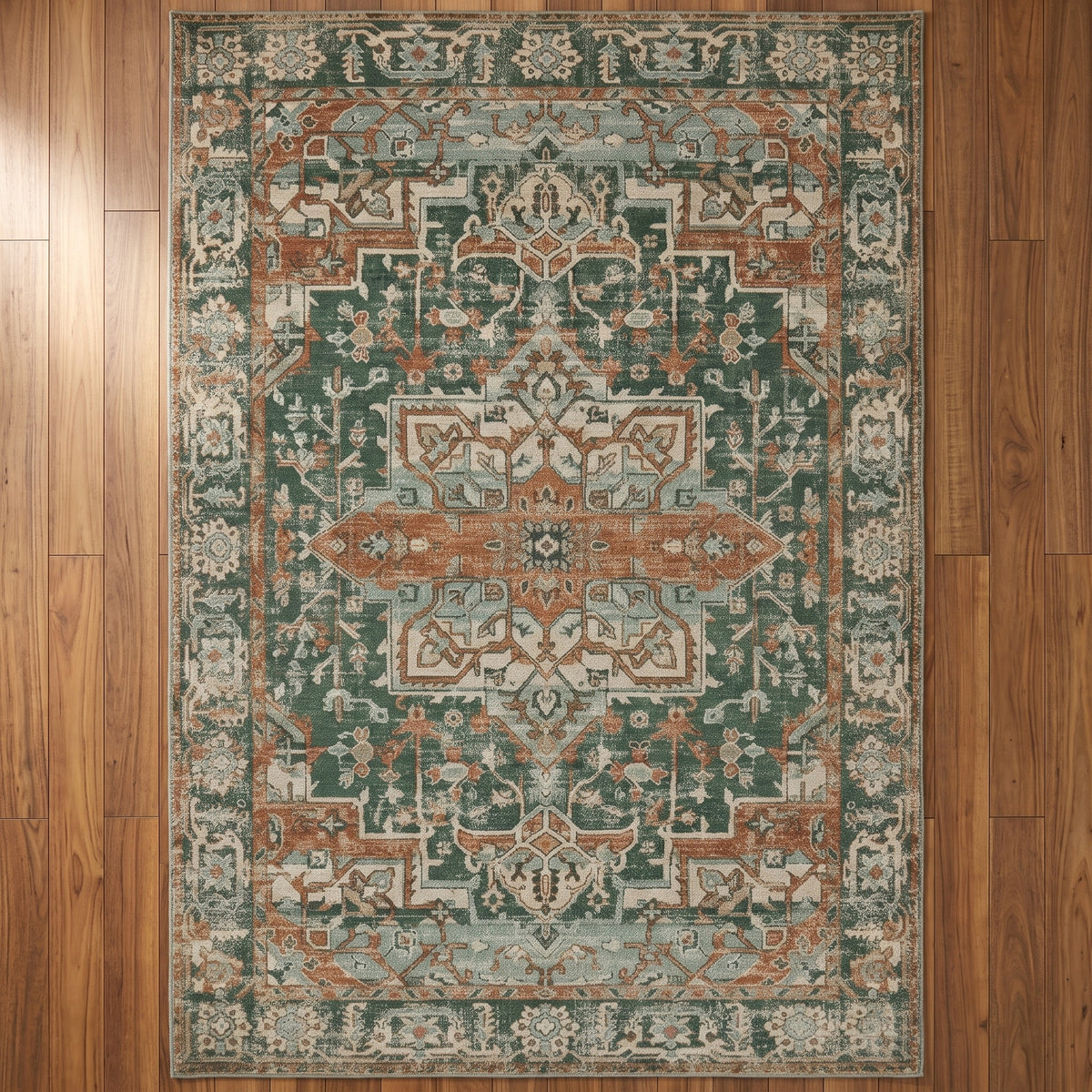 Golbahar Jade & Rust rug seen from above on a teak-toned floor