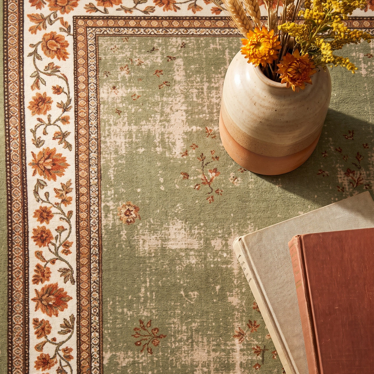 Golnar rug corner with a vase of dried flowers, soft low-pile velvet