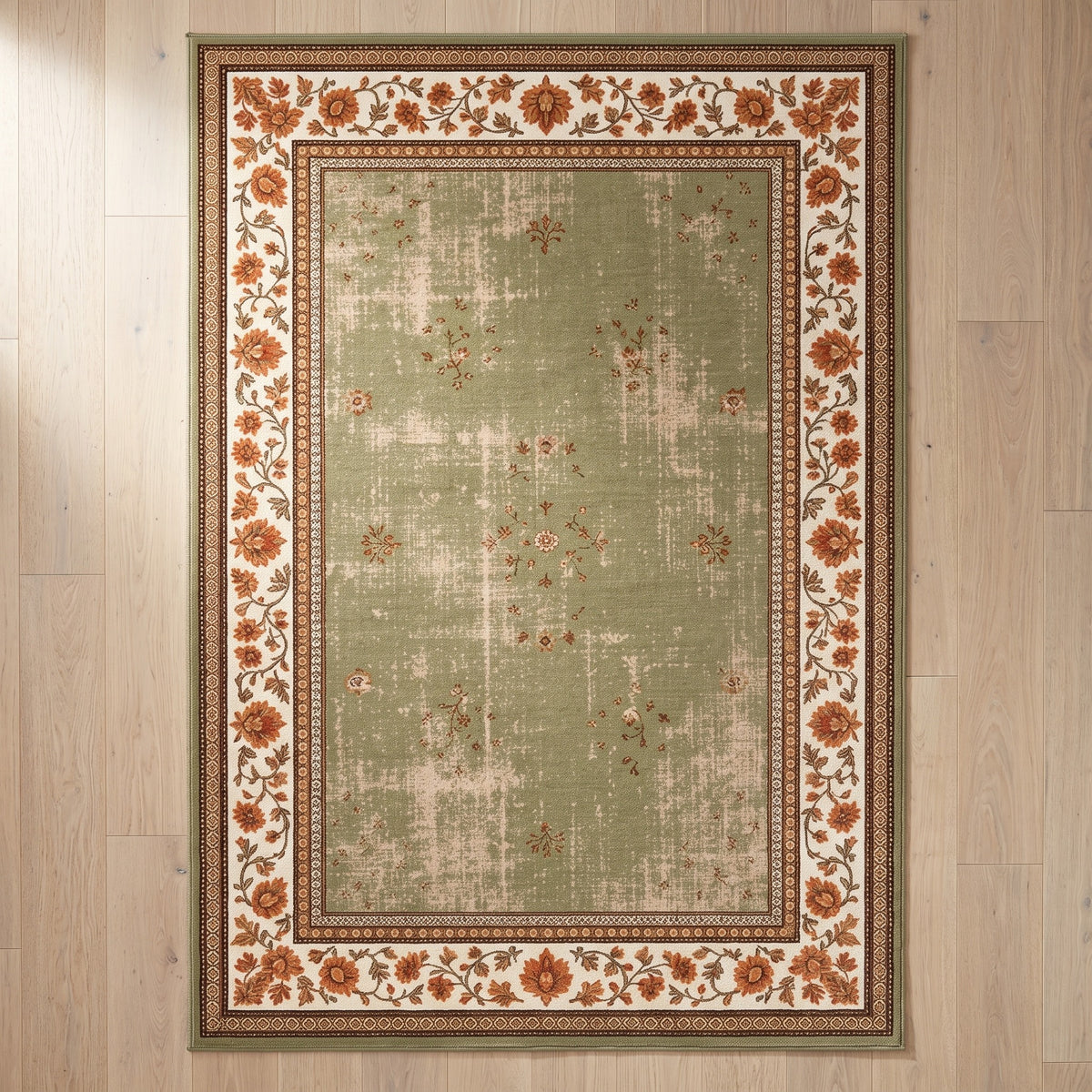 Golnar Sage & Saffron rug seen from above on a white oak floor