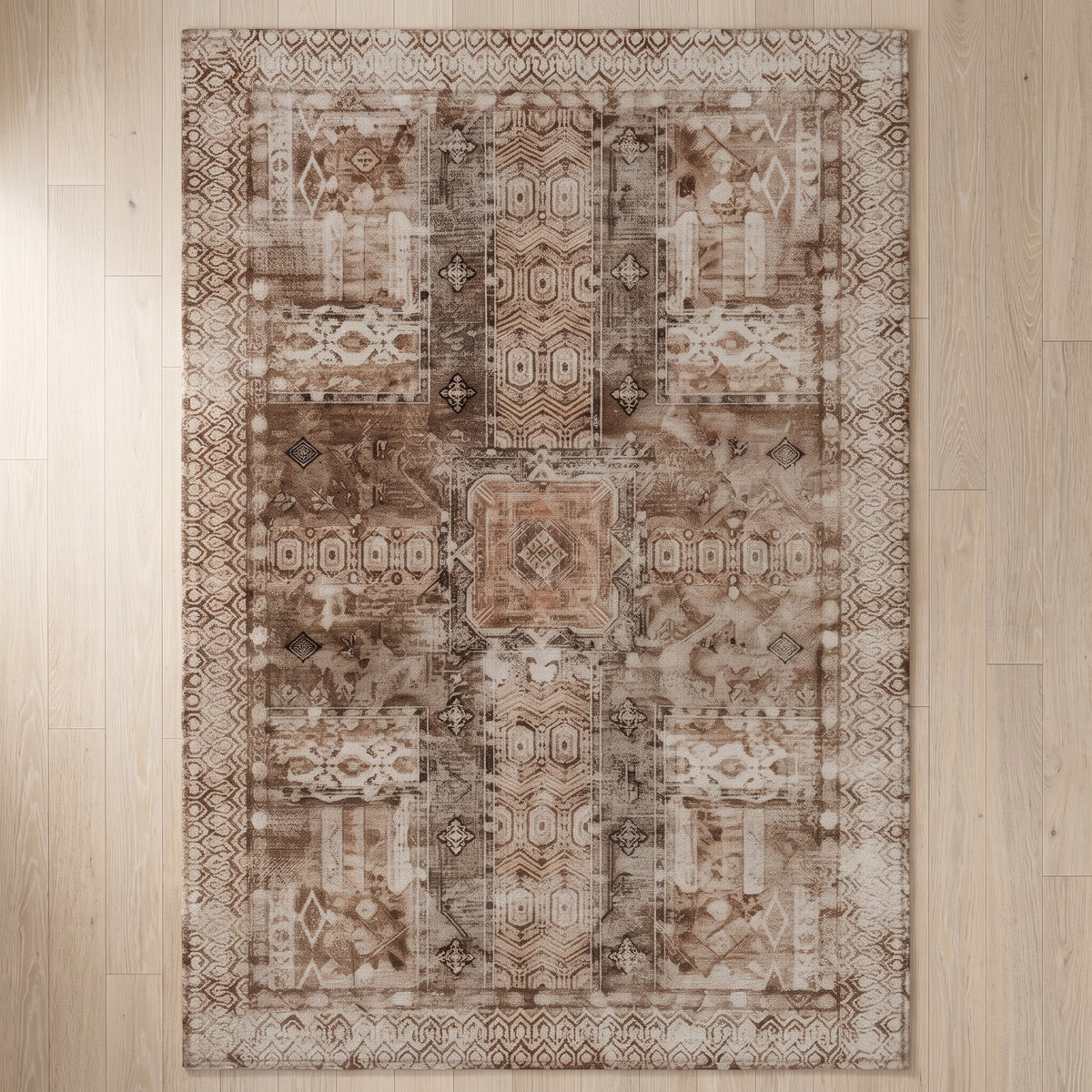 Kavir Sand & Cocoa rug seen from above on a bleached oak floor