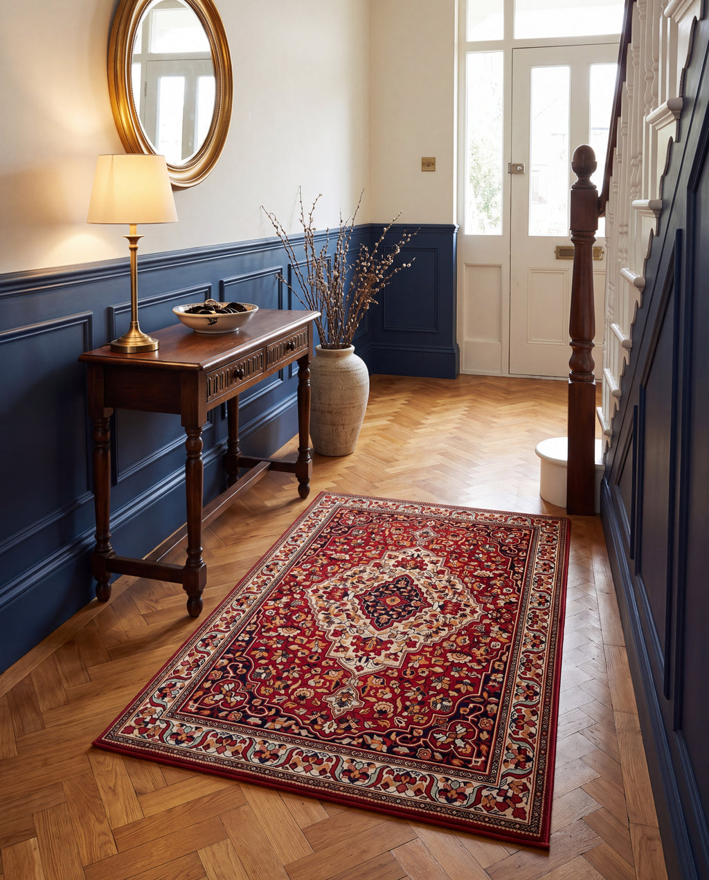 Laleh Garnet & Cream rug in an entryway with navy wainscoting