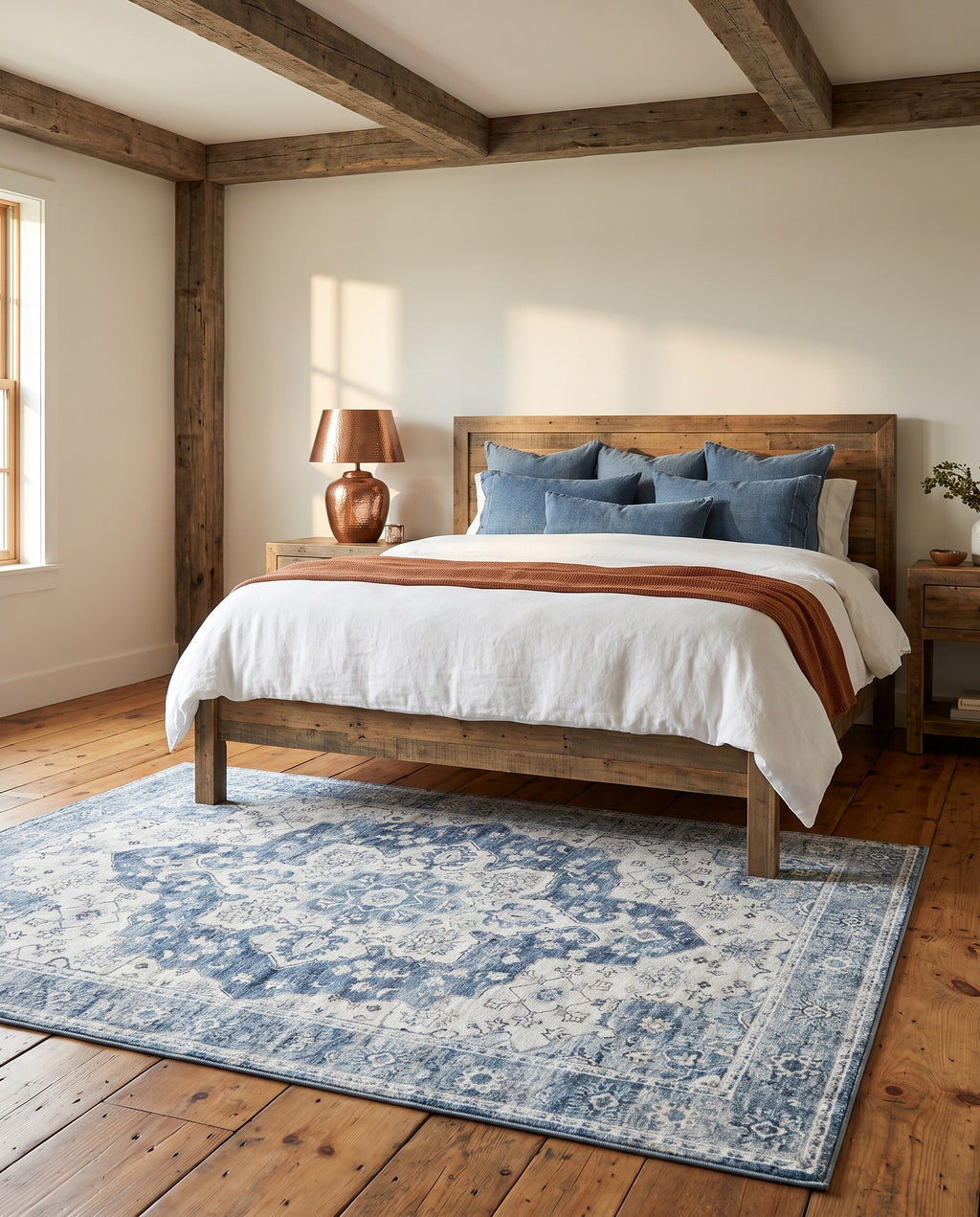 Mahtab Denim & Cream rug under a reclaimed wood bed in a ranch bedroom