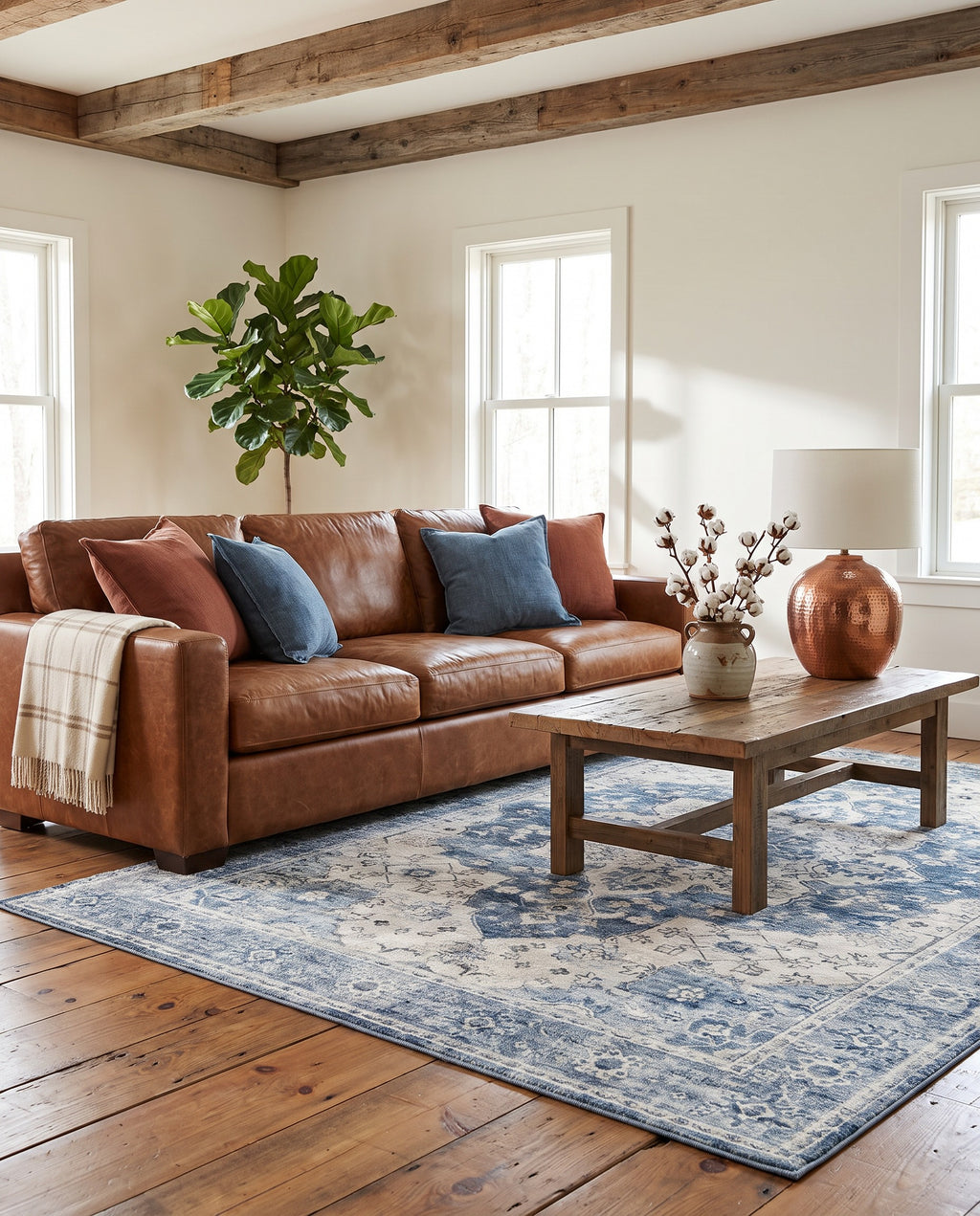 Mahtab Denim & Cream rug in a modern ranch living room with a cognac leather sofa