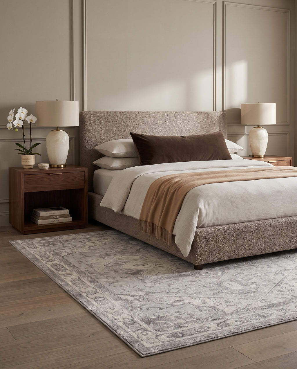 Morvarid Dove & Pearl rug under a taupe bouclé bed in a quiet luxury bedroom