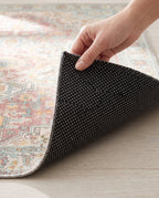 Dotted non-slip backing of the Nasrin rug