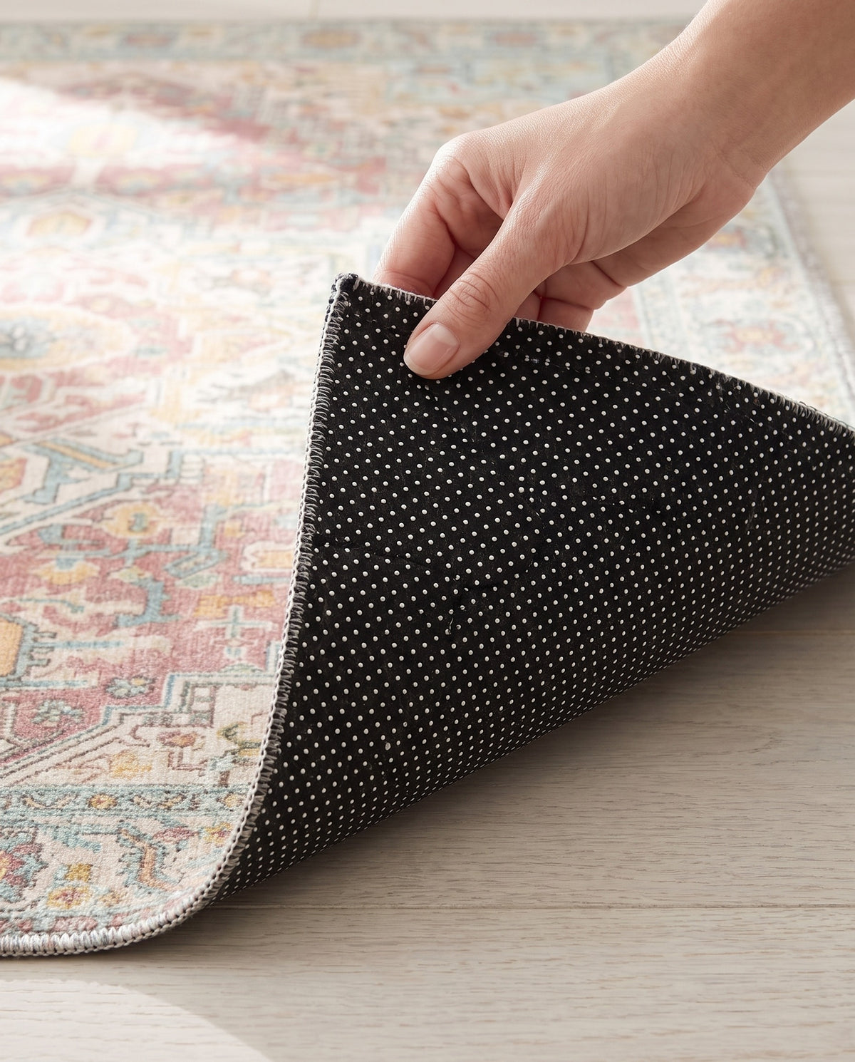 Dotted non-slip backing of the Nasrin rug