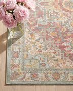 Close-up of the Nasrin rug border and dusty rose field, soft low-pile velvet