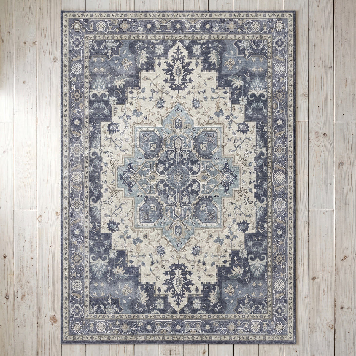 Nilufar Indigo & Ivory rug seen from above on a whitewashed pine floor