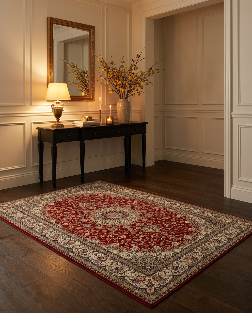 Shahrzad Crimson & Navy rug in a candlelit entryway with a gilded mirror