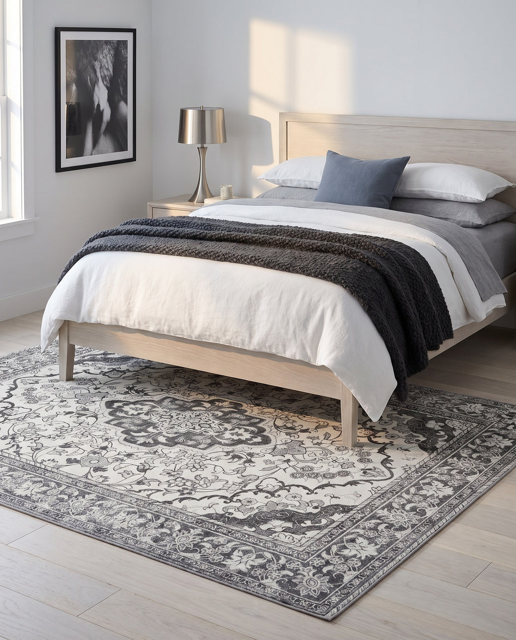 Simin Ash & Ivory rug under a pale ash bed in a calm minimalist bedroom