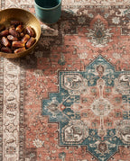 Close-up of the Soraya rug teal medallion and terracotta field, soft low-pile velvet