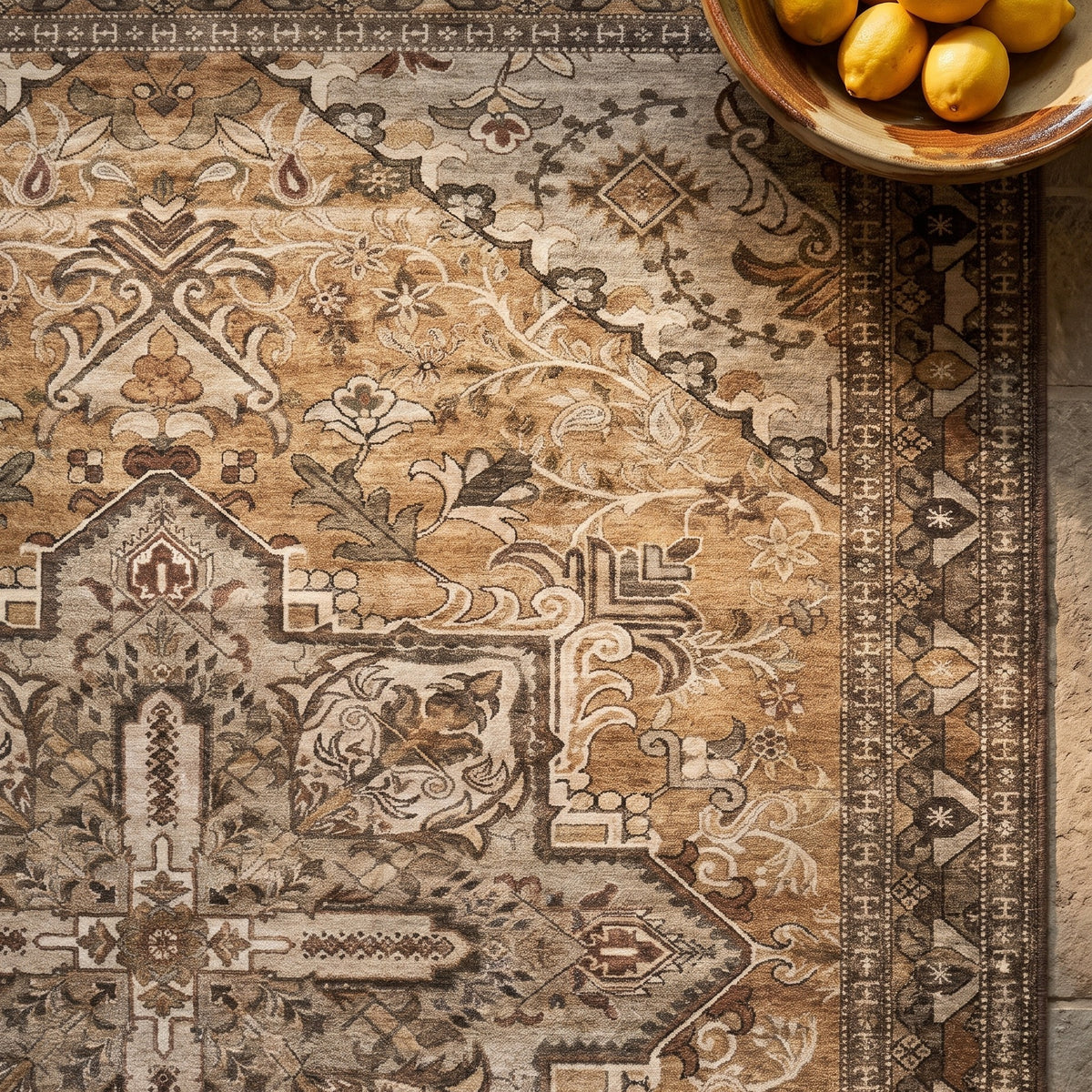 Zarin rug corner with a glazed bowl of lemons