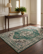Zomorrod Emerald & Ivory rug in a classic entryway with a walnut console and gilded mirror